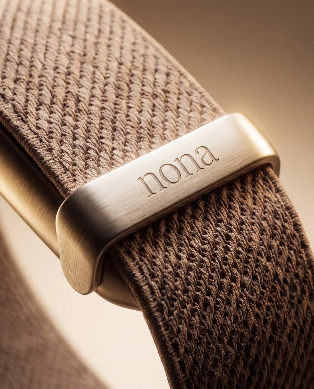 Close-up of the Nona clasp on the woven band